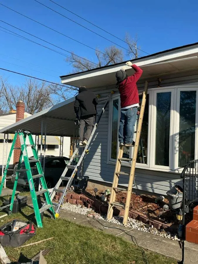 Restoration crew performing exterior repair in Lake St. Louis